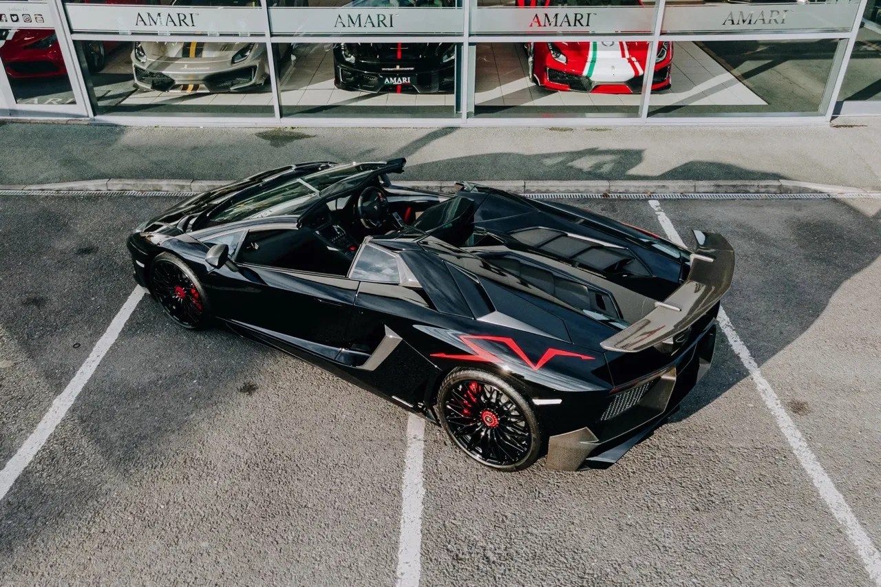 2016 Lamborghini Aventador SV Roadster for sale, exterior, Nero Cosmus w/ Rosso Alala