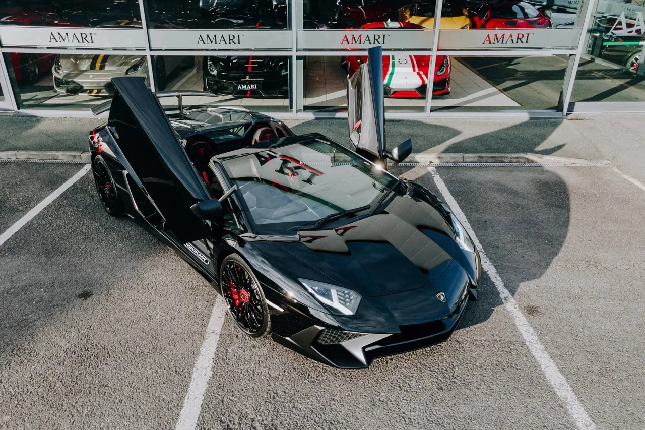 2016 Lamborghini Aventador SV Roadster for sale, exterior, Nero Cosmus w/ Rosso Alala