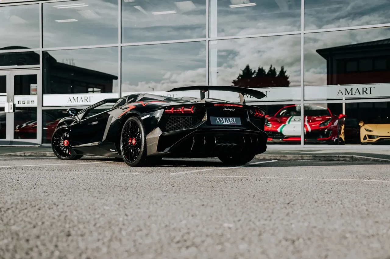 2016 Lamborghini Aventador SV Roadster for sale, exterior, Nero Cosmus w/ Rosso Alala