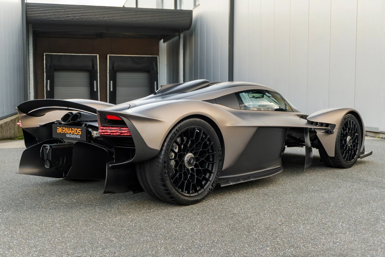 2022 Aston Martin Valkyrie, rear three-quarter view, Satin Arizona Bronze