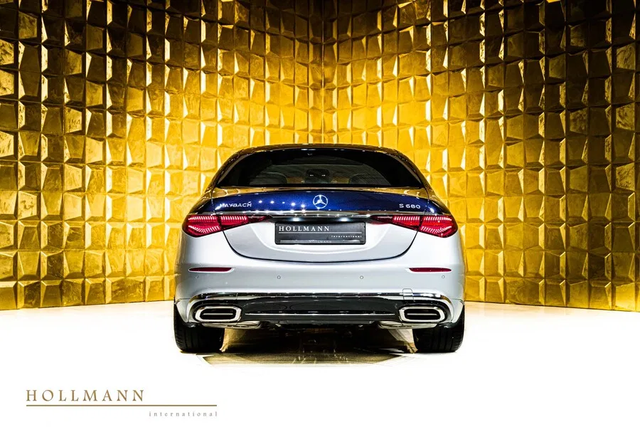 2024 Mercedes-Maybach S 680 4MATIC, rear three-quarter view, Silver - Nautical Blue