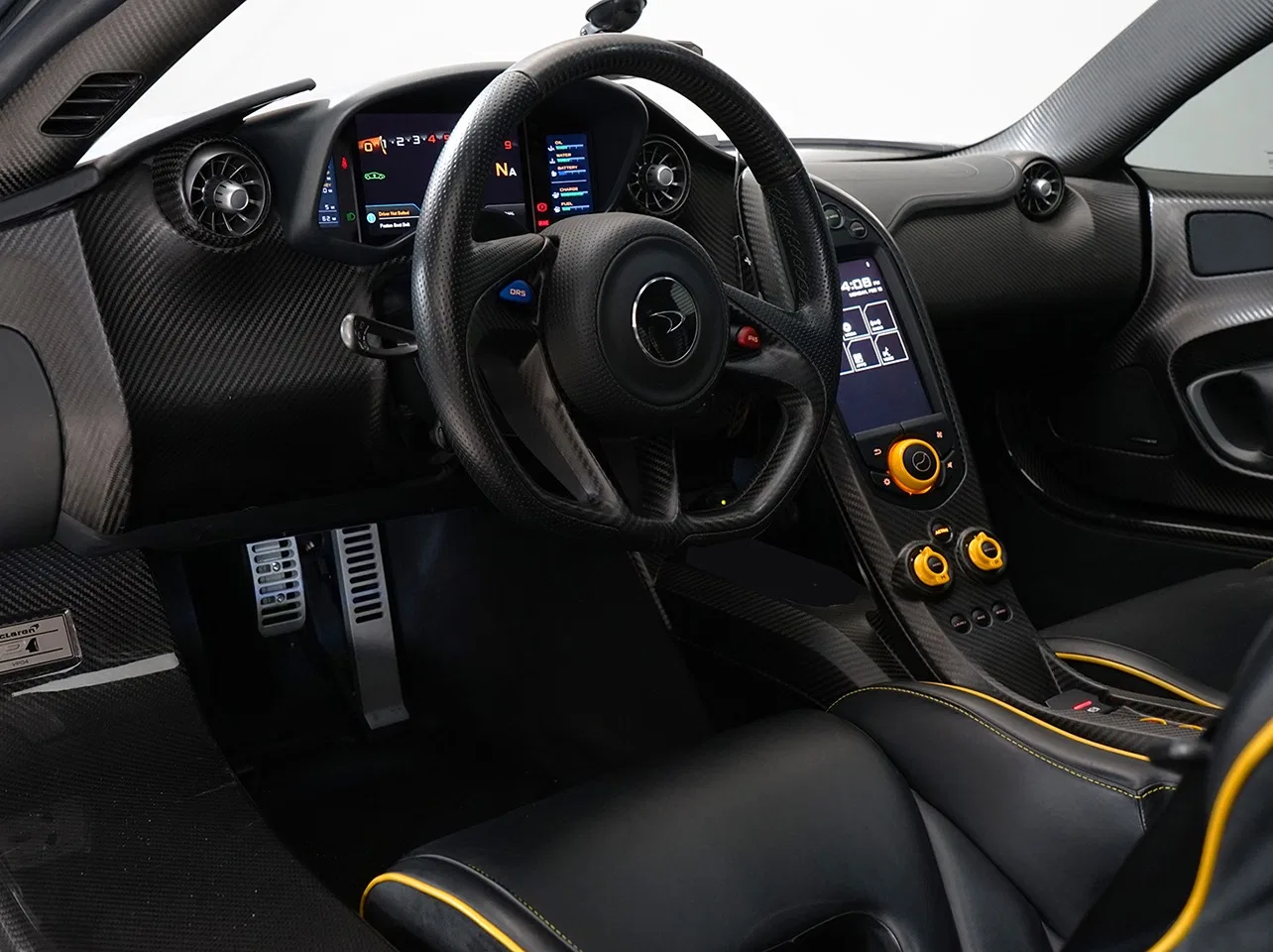 2013 McLaren P1 interior, dashboard, Black with Yellow inserts