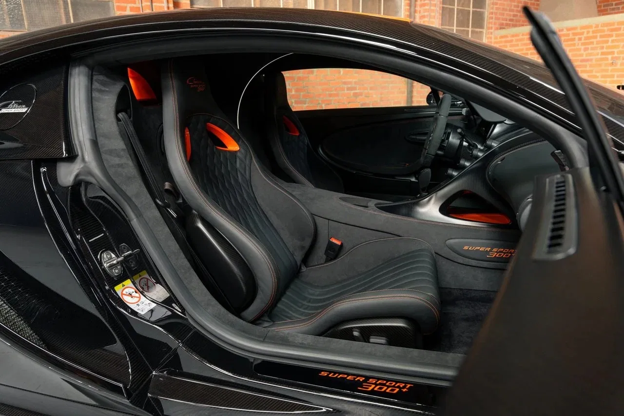 2022 Bugatti Chiron Super Sport 300+ interior, Beluga Black with Jet Orange accents