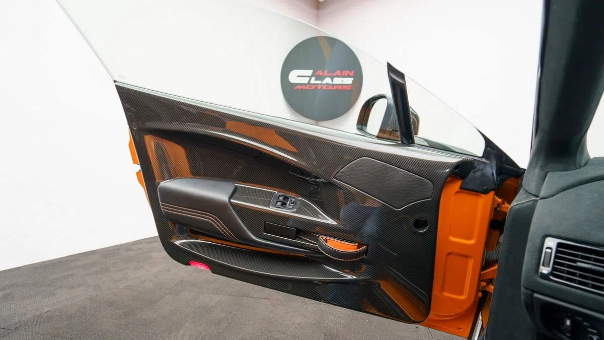 2016 Aston Martin Vantage GT12 interior, door panel, Black/Orange