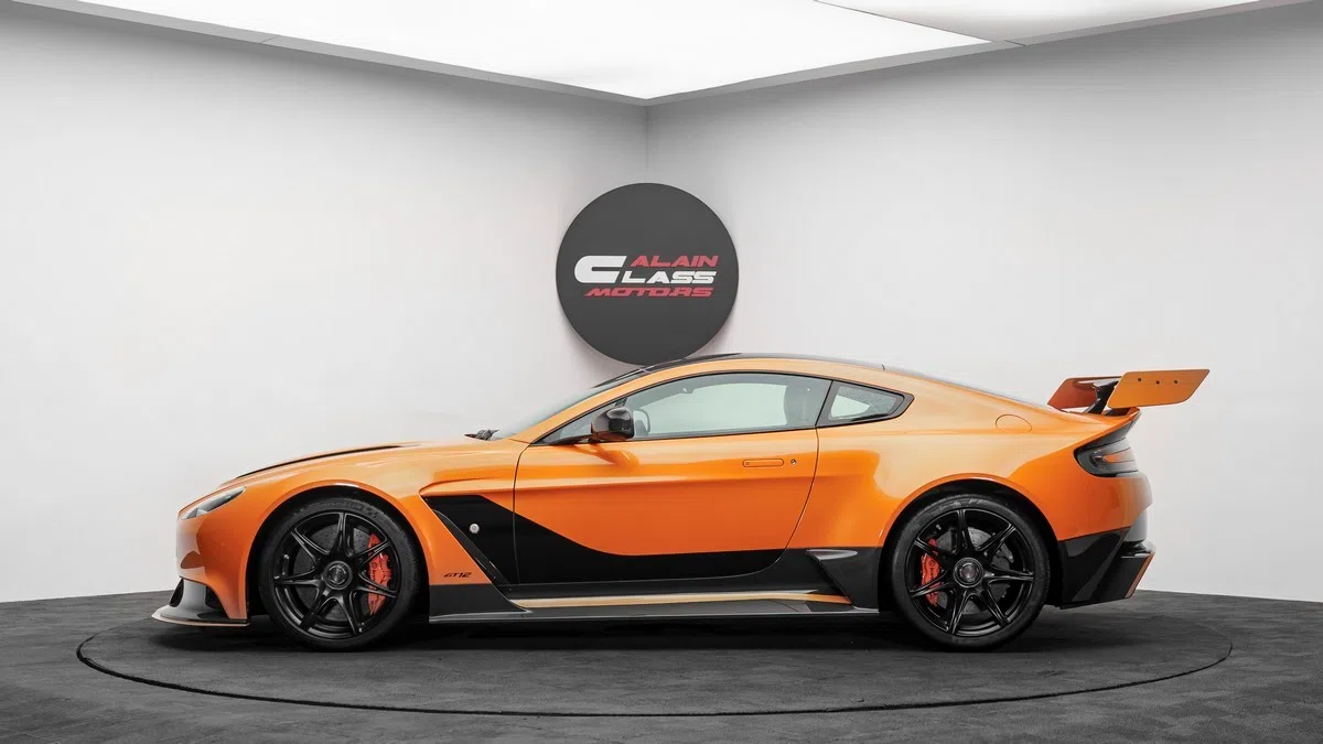 2016 Aston Martin Vantage GT12, side profile, Orange