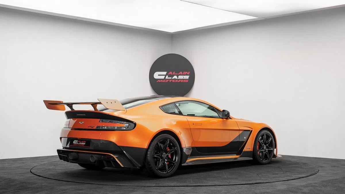 2016 Aston Martin Vantage GT12, side profile, Orange
