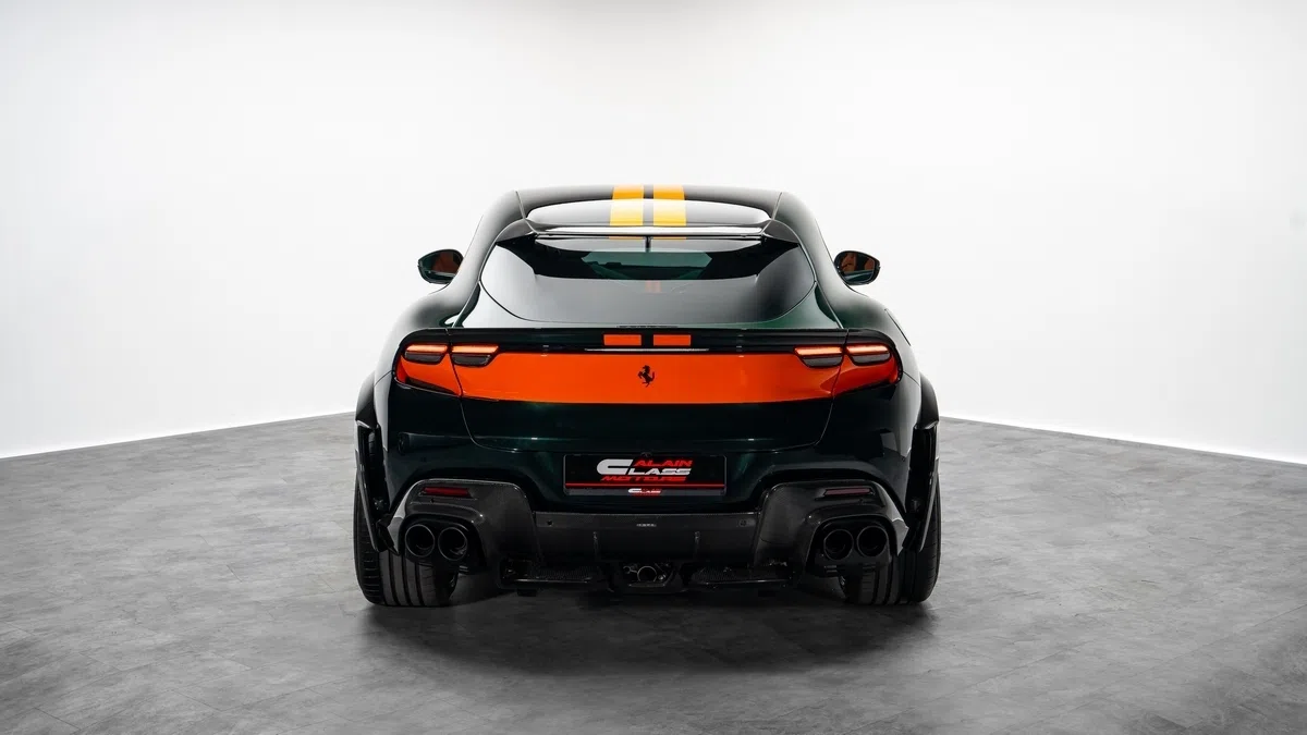2025 Ferrari Purosangue ESTESO, rear three-quarter view, Verde Zeltweg | Arancio Stripe