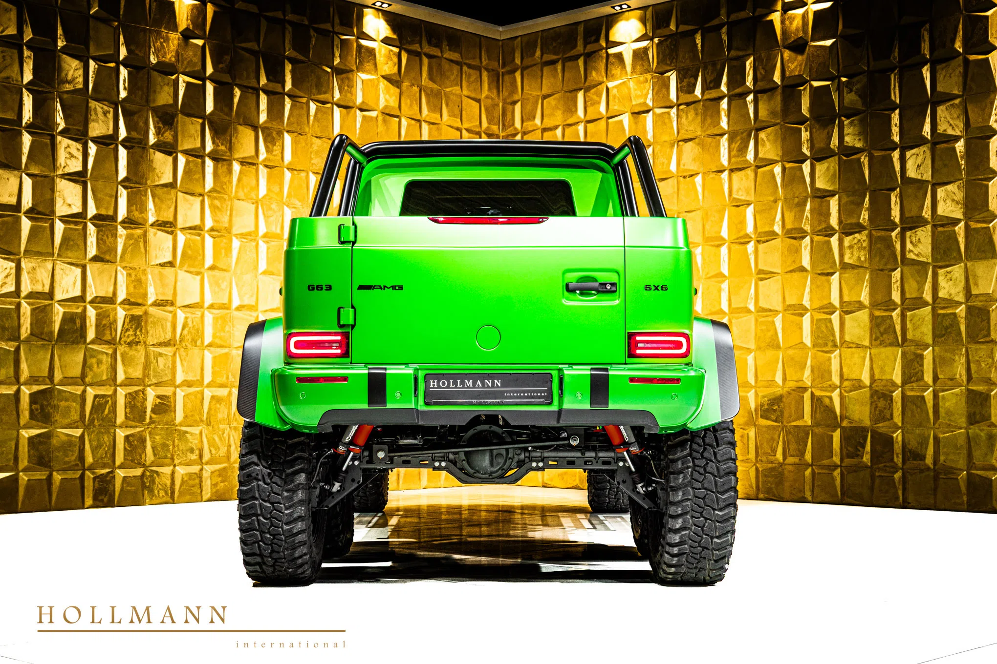 2026 G 63 AMG 6x6, rear three-quarter view, Light Green Magno
