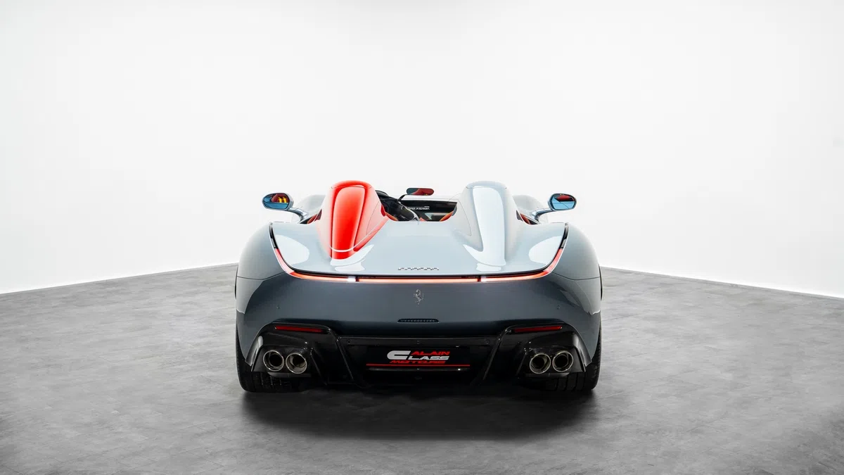 2022 Ferrari Monza SP2, rear three-quarter view, Grigio Titanio / Rosso Corsa livery