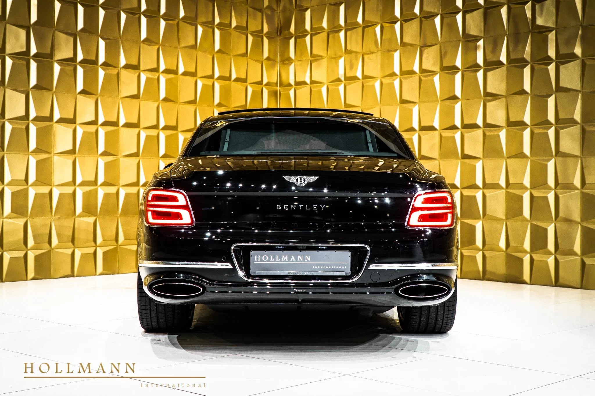 2020 Bentley Flying Spur FIRST EDITION, rear three-quarter view, Onyx Black