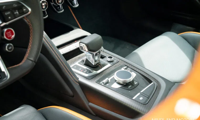 2017 Audi R8 V10 Plus Exclusive interior, center console, Black / Orange