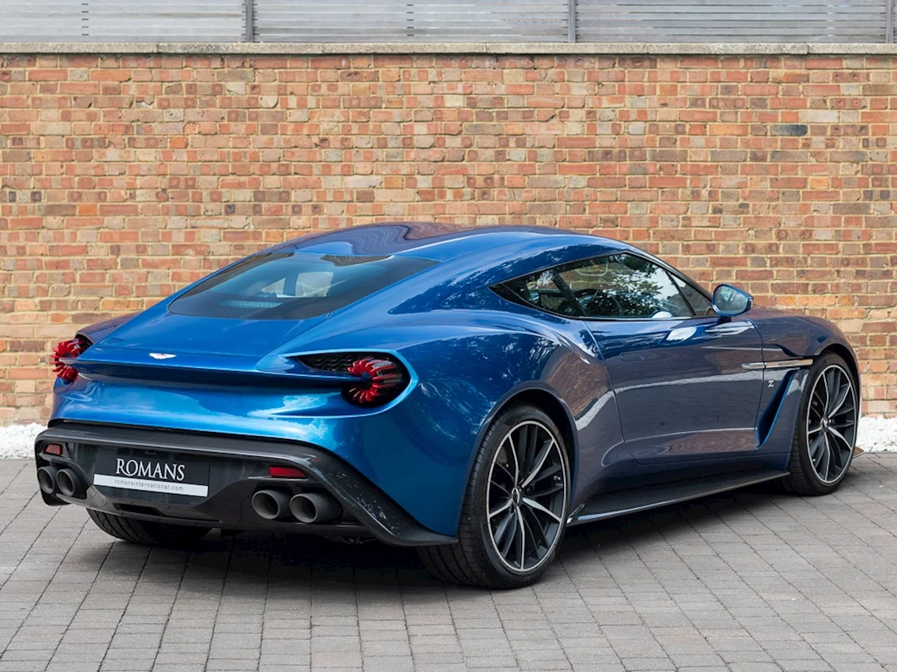 2017 Aston Martin Vanquish Zagato Coupe, rear three-quarter view, Ming Blue