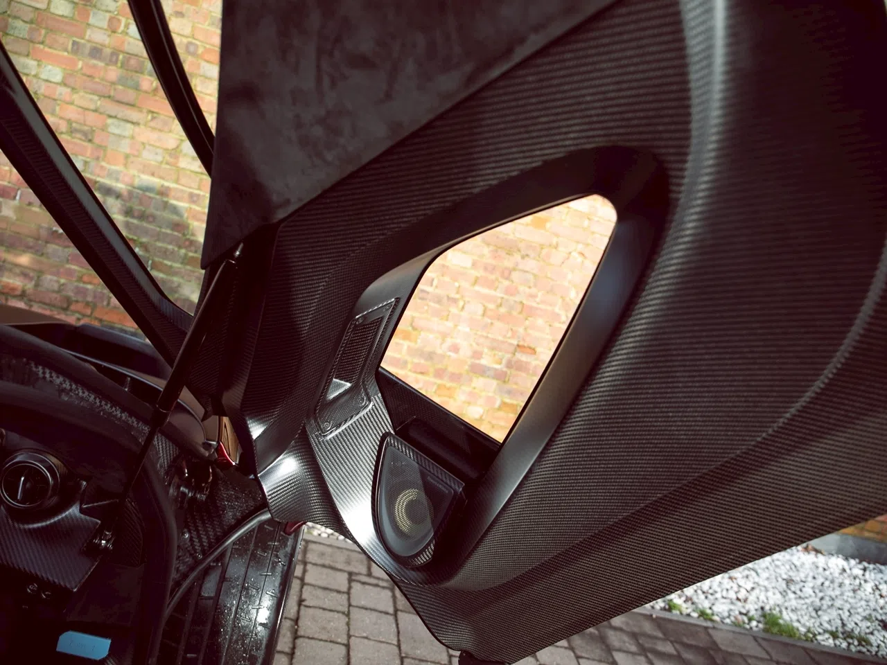 2019 McLaren Senna interior, door panel, Black Alcantara