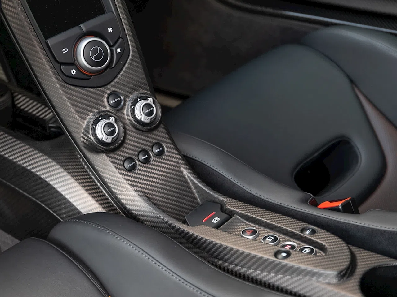 2015 McLaren P1 interior, center console, Carbon Black Leather/Alcantara
