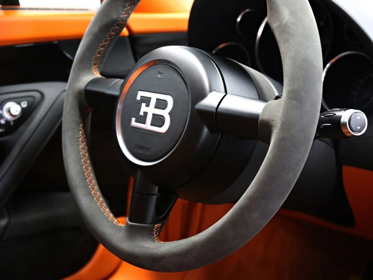 2011 Bugatti Veyron Supersport interior, steering wheel, Burnt Orange Hide
