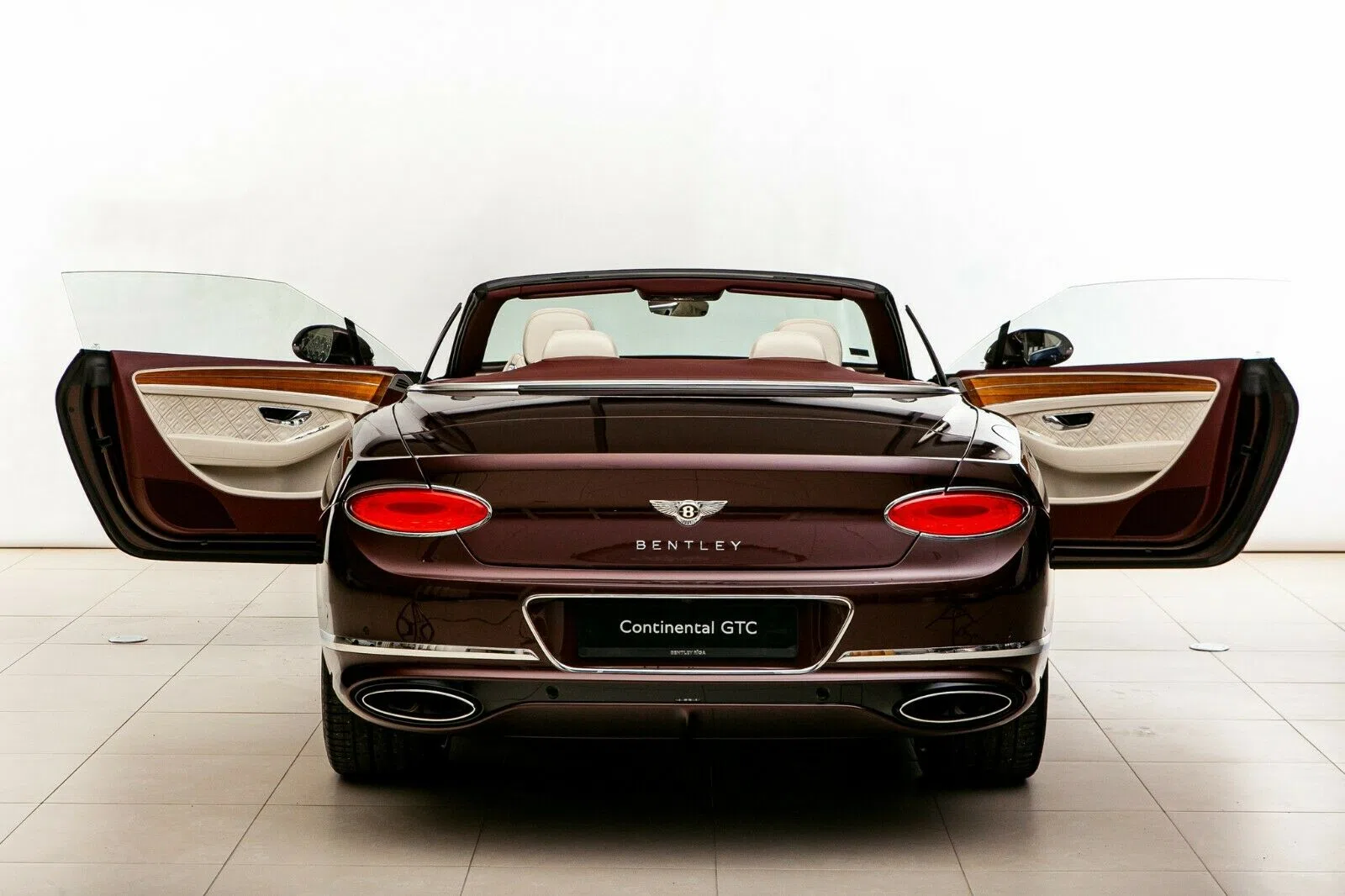 2019 Bentley Continental GTC 6.0 W12 1st Edition, rear three-quarter view, Cricket Ball