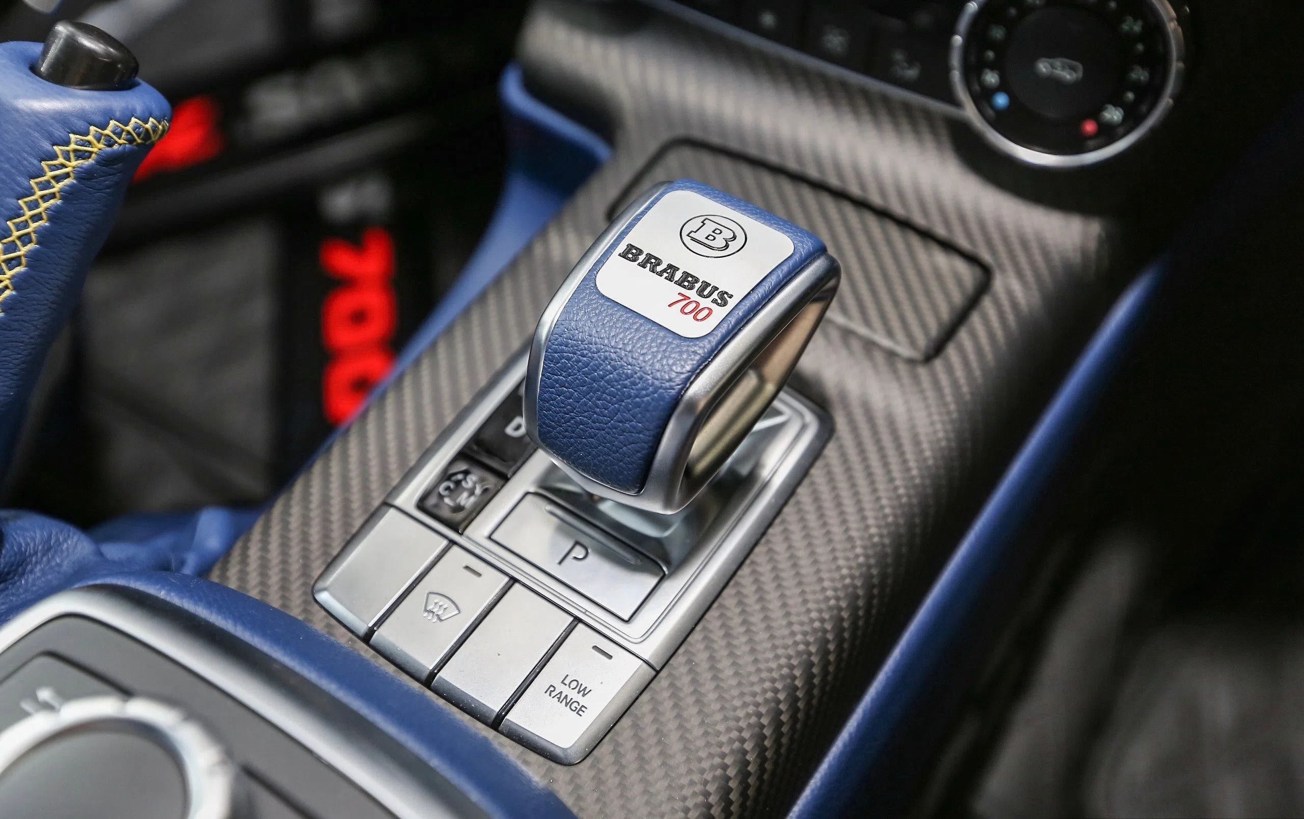 BRABUS G 700 6x6 interior, center console, Blue-Yellow