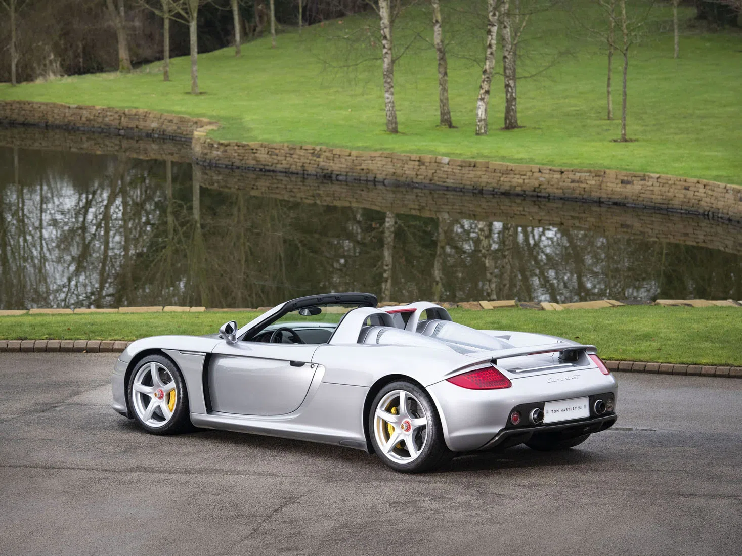 2004 Porsche Carrera GT, rear three-quarter view, GT Silver