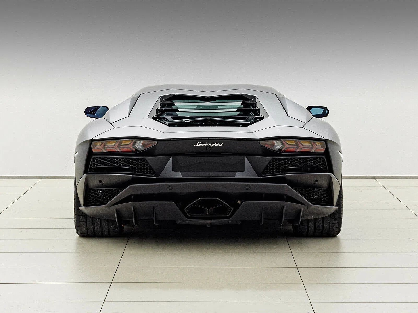 2018 Lamborghini Aventador S LP740-4 Coupe, rear three-quarter view, Nero Nemesis