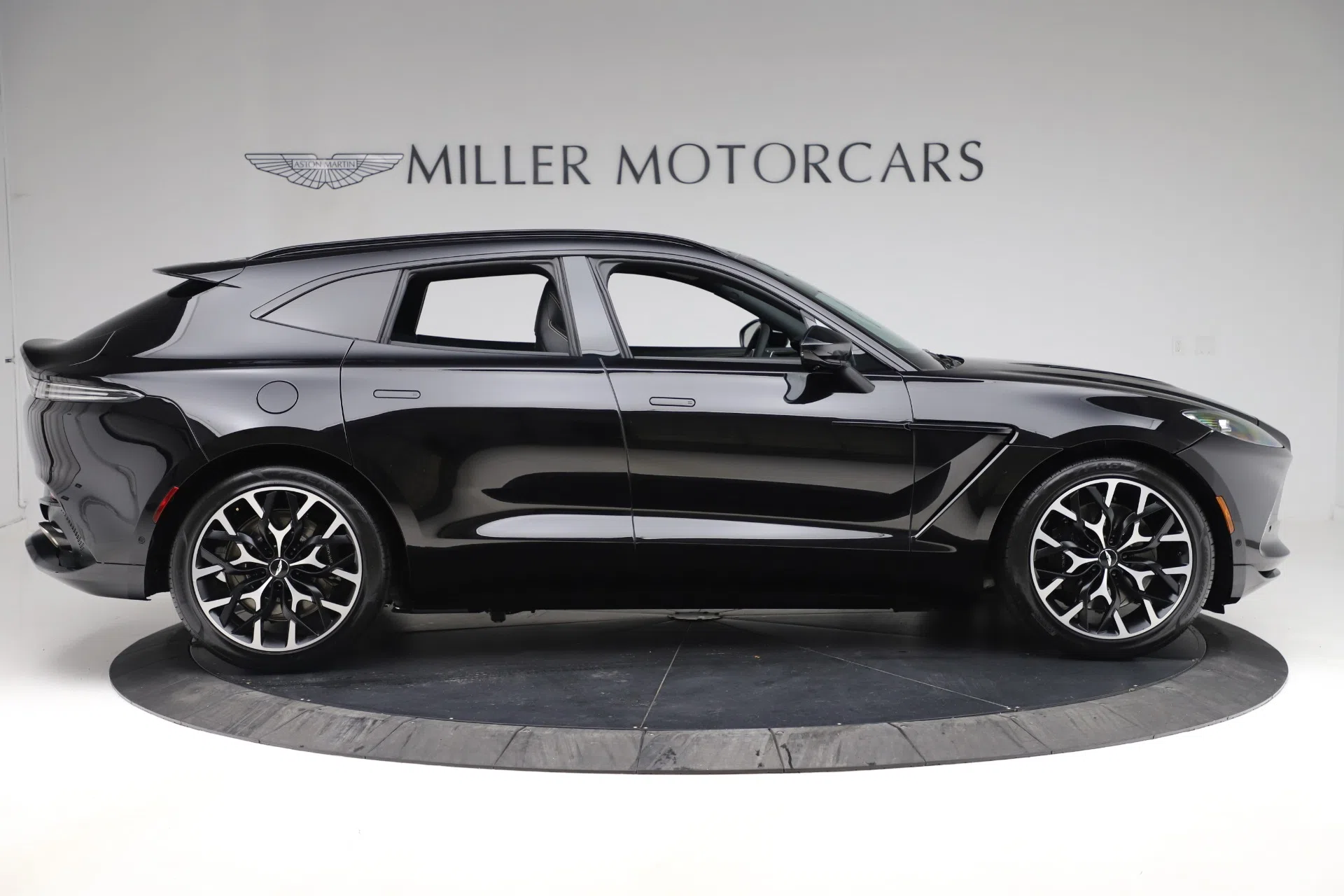 2020 Aston Martin DBX SUV, side profile, Black