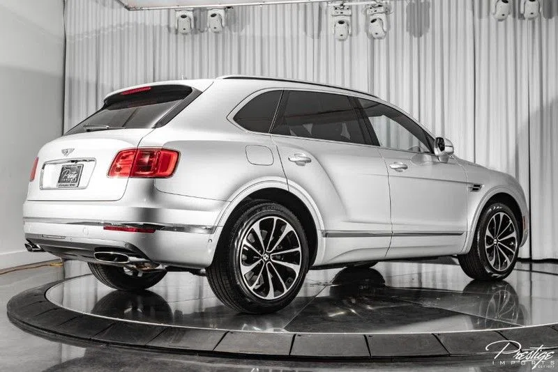 2018 Bentley Bentayga, rear three-quarter view, Grey