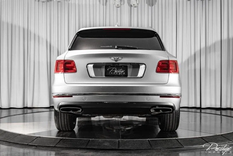 2018 Bentley Bentayga, rear three-quarter view, Grey