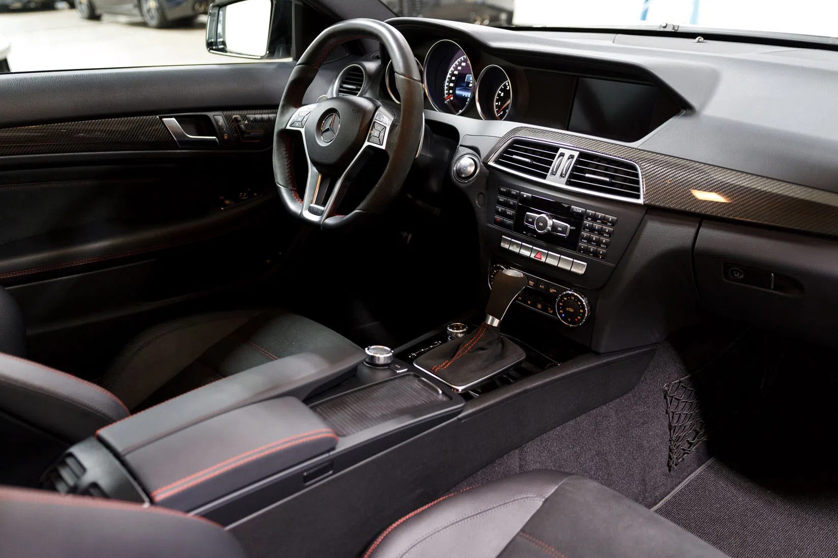 2013 Mercedes-Benz C63 AMG Black Series interior, Black with Red Stitching