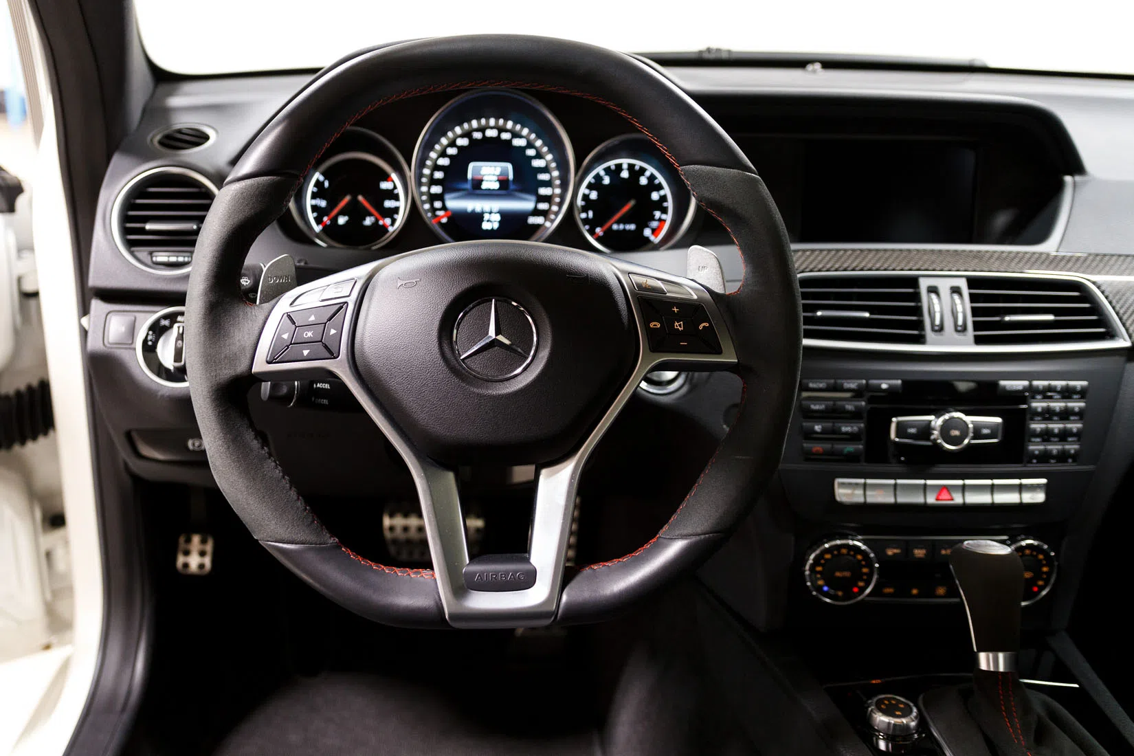 2013 Mercedes-Benz C63 AMG Black Series interior, dashboard, Black with Red Stitching