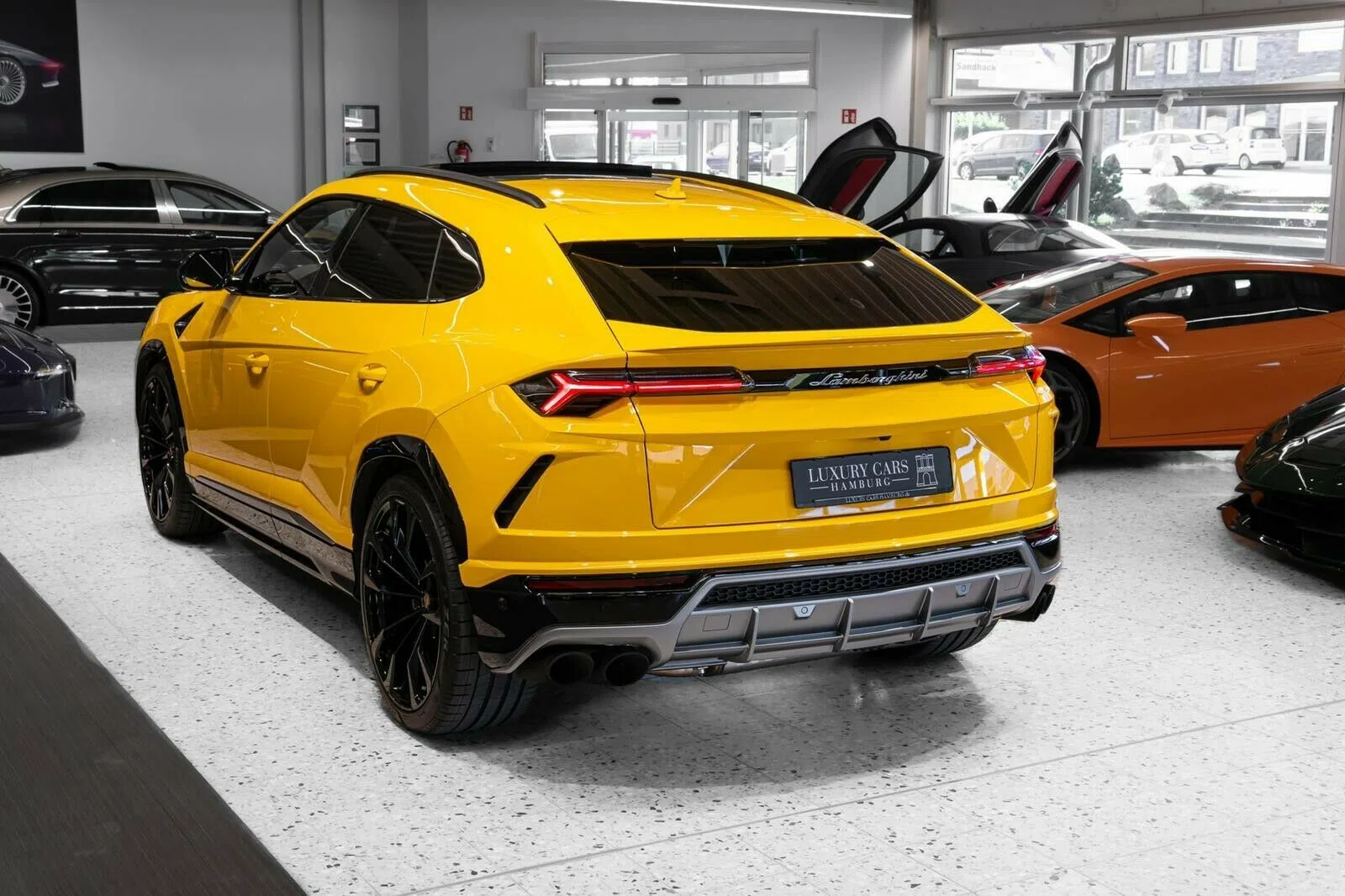 2020 Lamborghini Urus, rear three-quarter view, Giallo Eye Yellow / Yellow