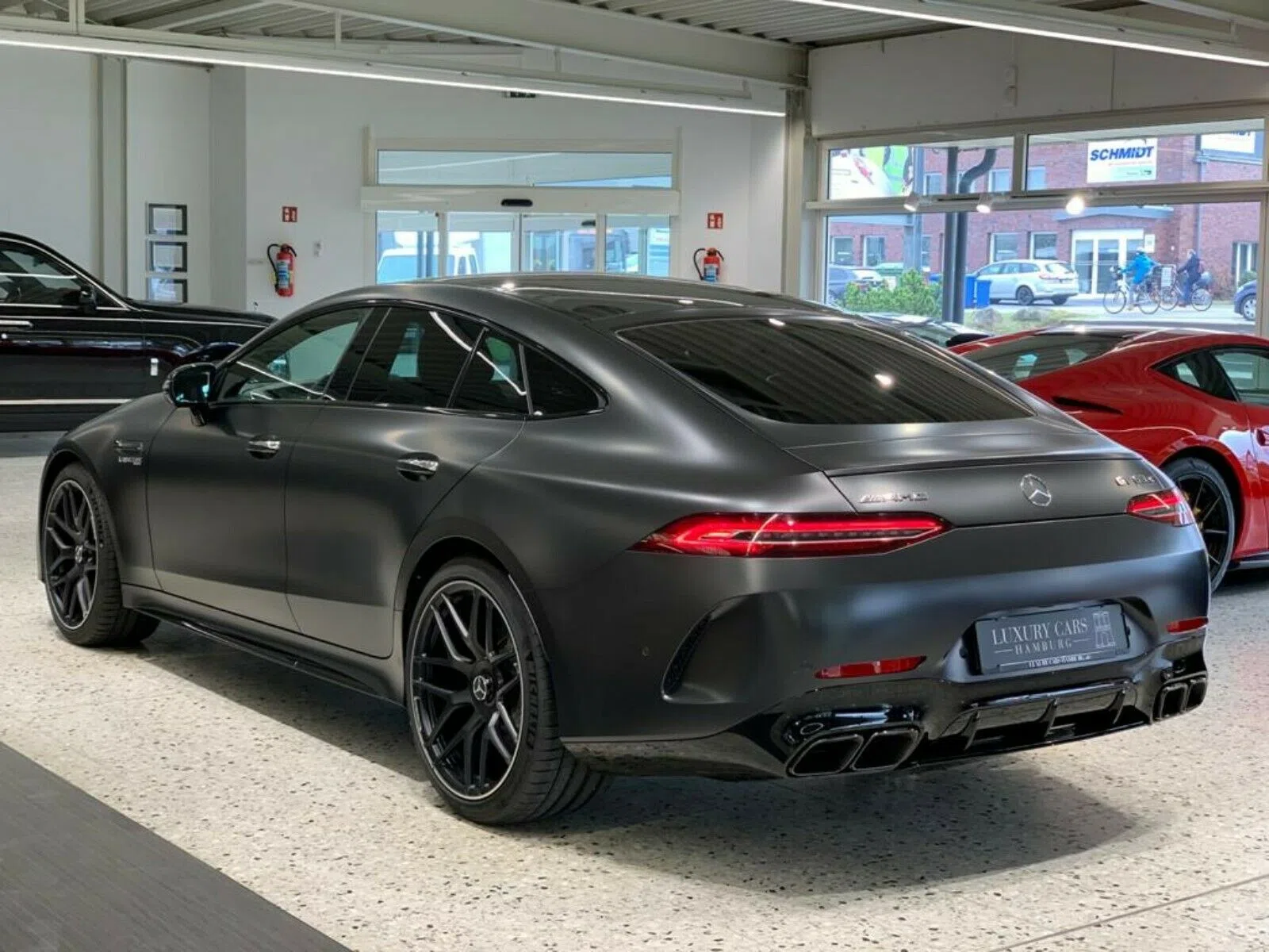 2019 Mercedes-Benz AMG GT 63 S 4MATIC, rear three-quarter view, Designo Graphit Gray Magno Exterior