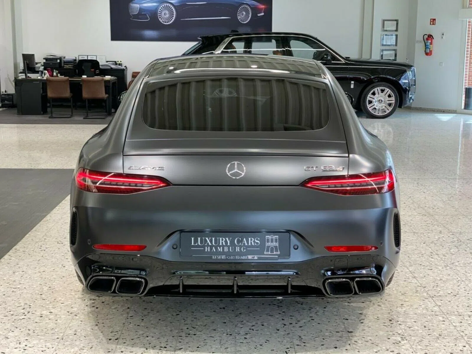 2019 Mercedes-Benz AMG GT 63 S 4MATIC, rear three-quarter view, Designo Graphit Gray Magno Exterior