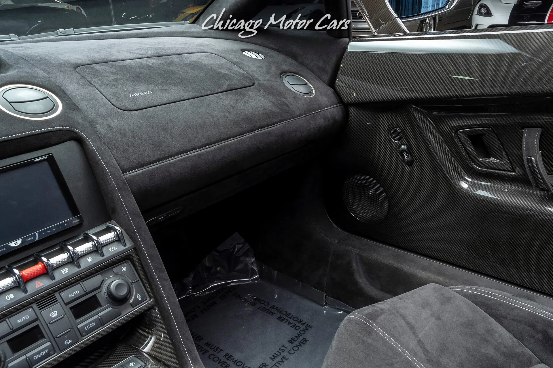 2011 Lamborghini Gallardo LP570-4 Performante Spyder interior, center console, Nero Perseus Black