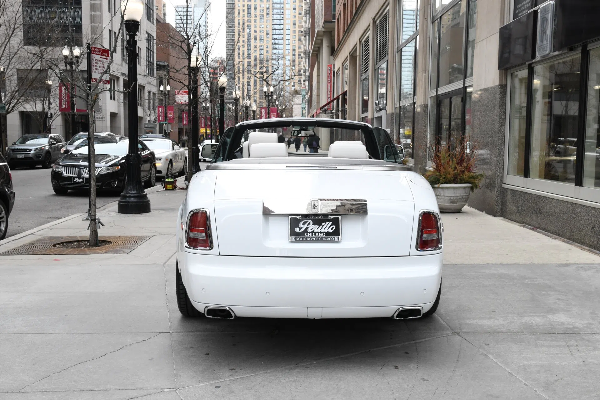 2015 Rolls-Royce Phantom Drophead Coupe, rear three-quarter view, Arctic White