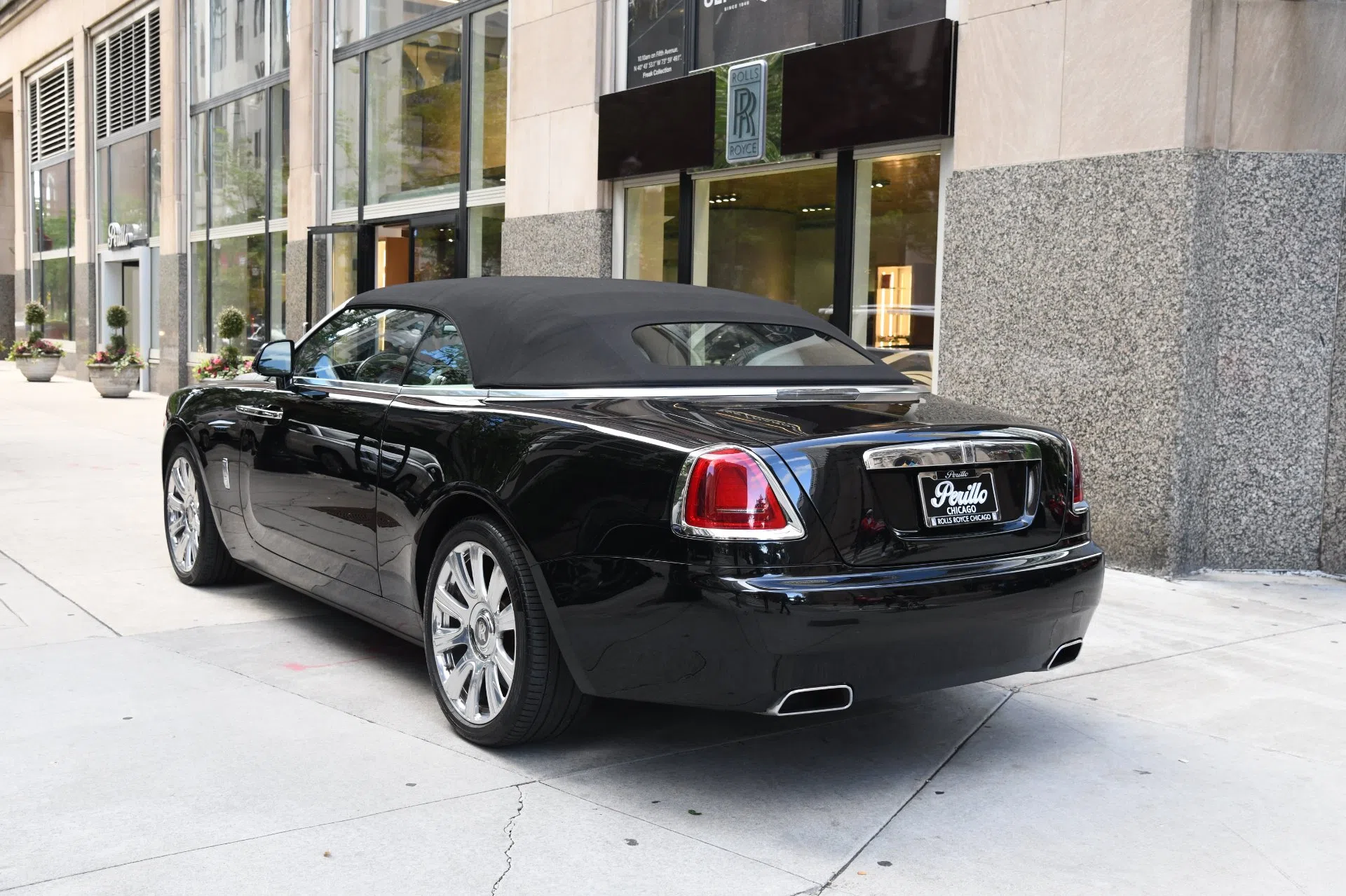 2016 Rolls-Royce Dawn, rear three-quarter view, Black