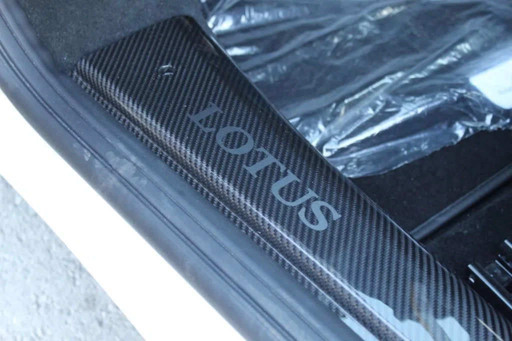 2020 Lotus Evora GT interior, door sill, Black Leather
