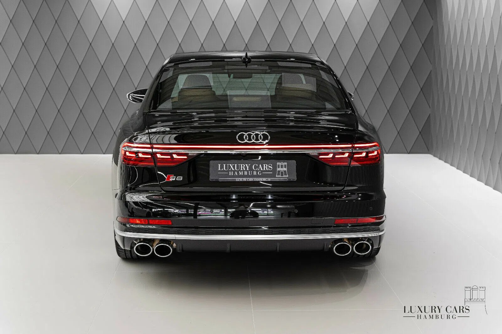 2020 Audi S8, rear three-quarter view, Mythos Black Metallic