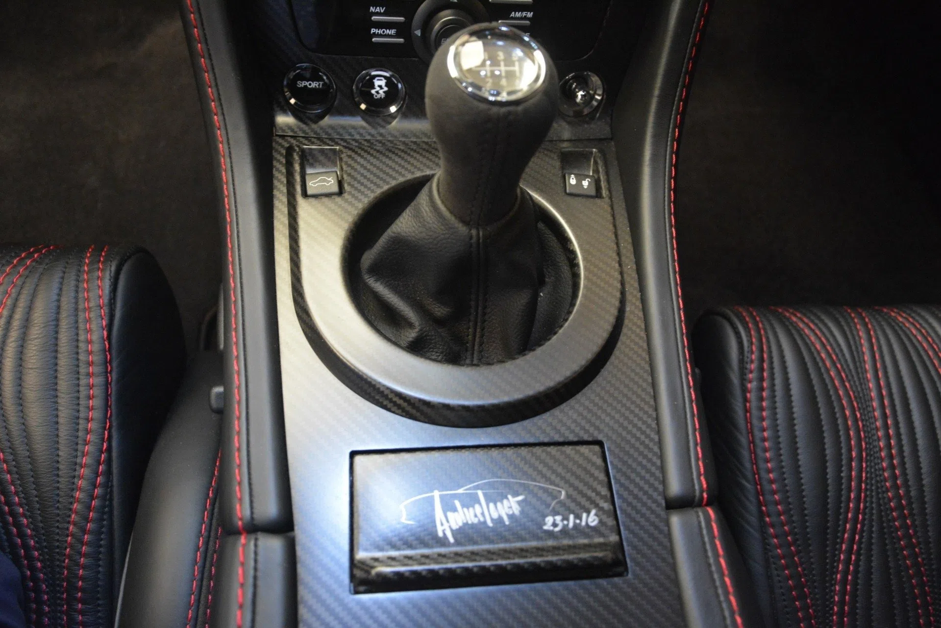 2013 Aston Martin V12 Zagato Coupe interior, center console, Obsidian Black