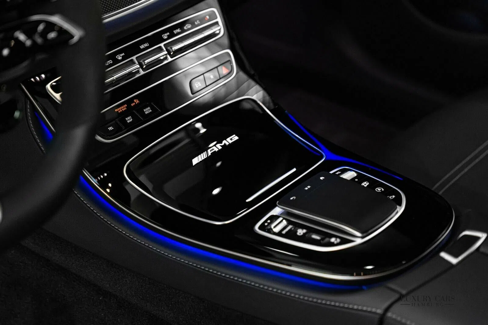 2020 Mercedes-Benz E 63 AMG S+ interior, center console, Red Leather