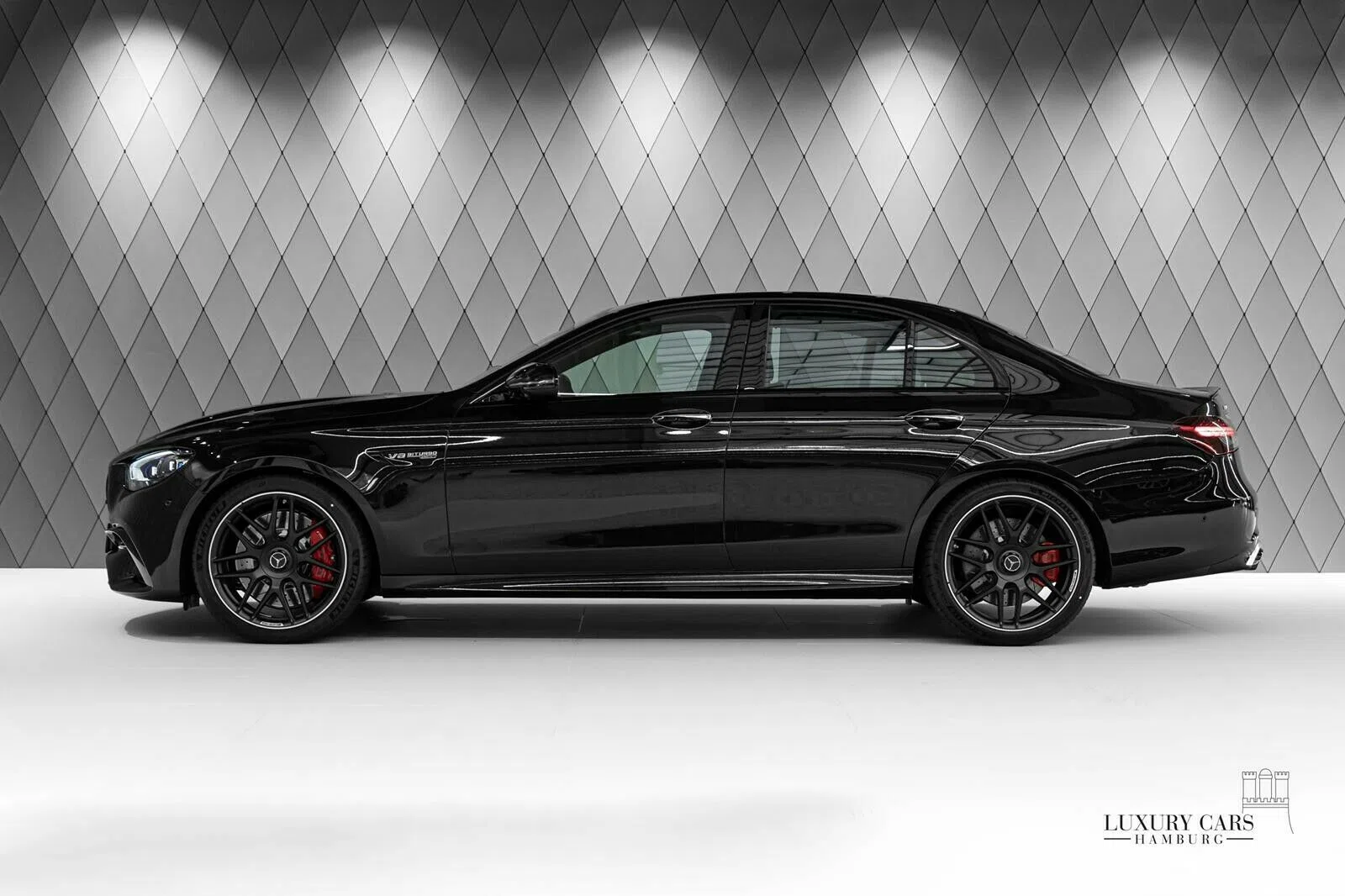 2020 Mercedes-Benz E 63 AMG S+, side profile, Black