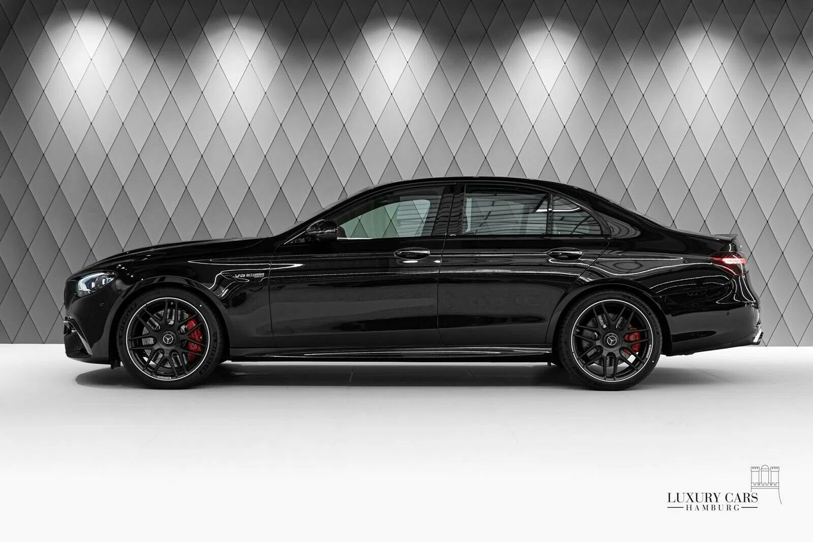 2020 Mercedes-Benz E 63 AMG S+, side profile, Black