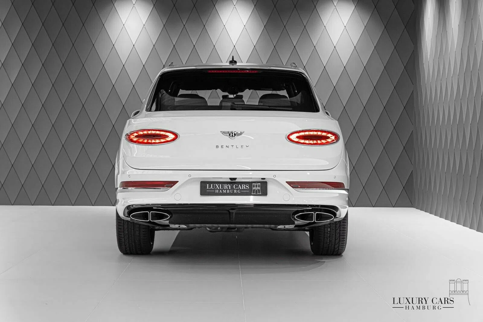 2021 Bentley Bentayga, rear three-quarter view, White