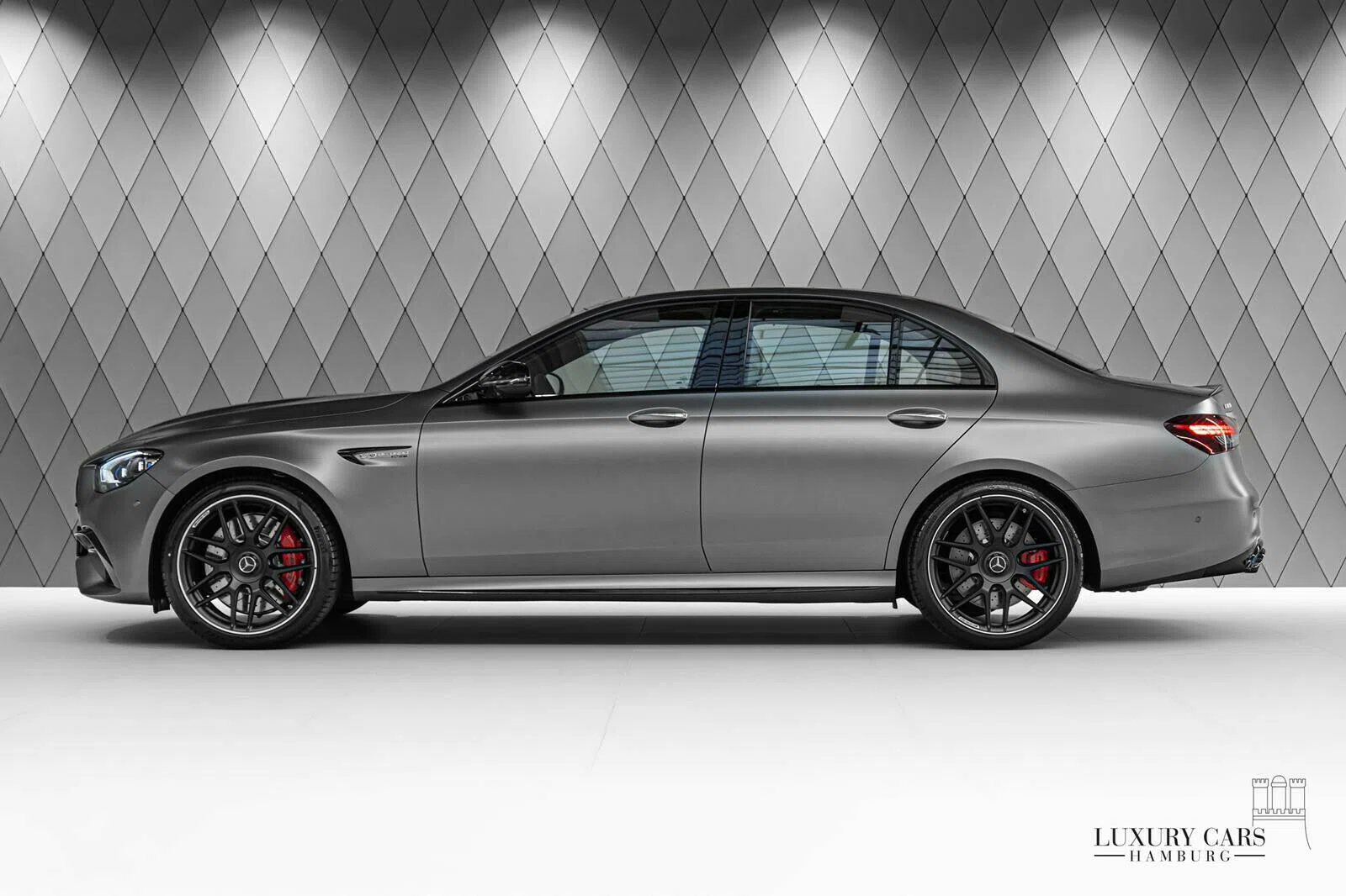 2021 Mercedes-Benz E 63 AMG S+, side profile, Designo Selenite Grey Magno
