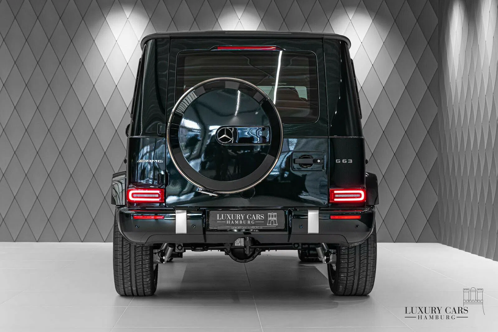 2021 Mercedes-Benz G 63 AMG, rear three-quarter view, Emerald Green