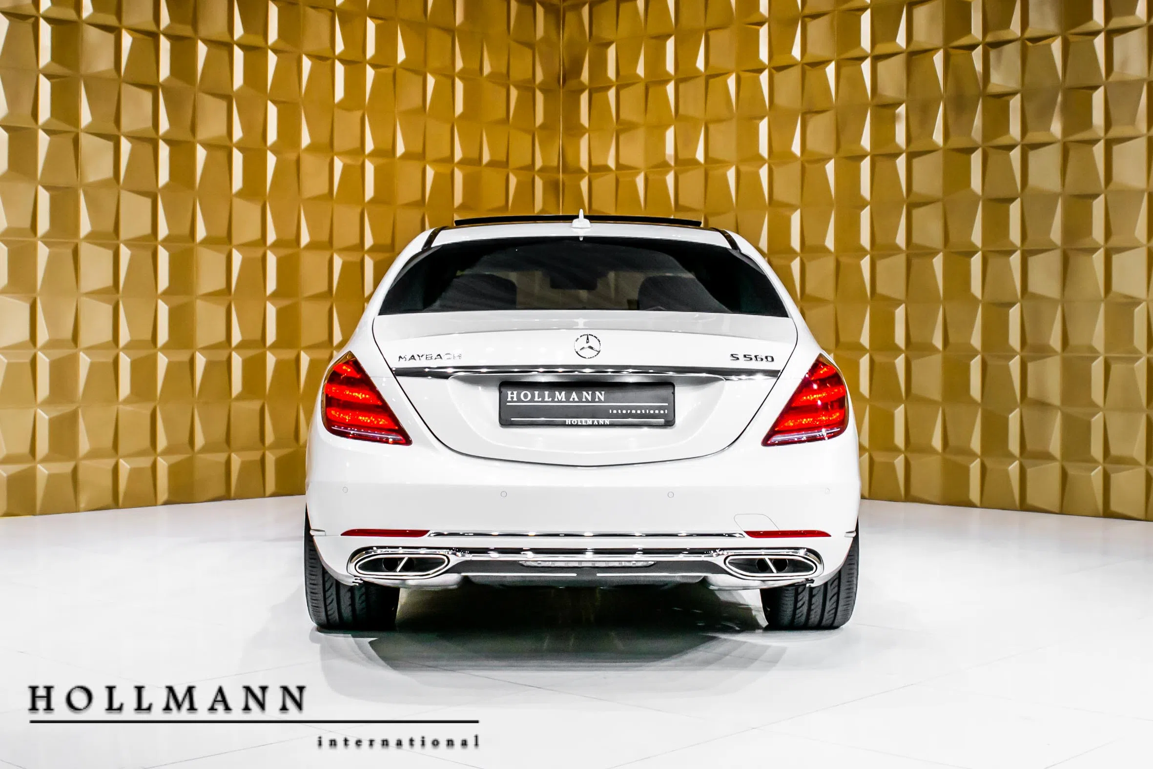 2019 Mercedes-Maybach S 560 L 4M, rear three-quarter view, Designo diamond white bright