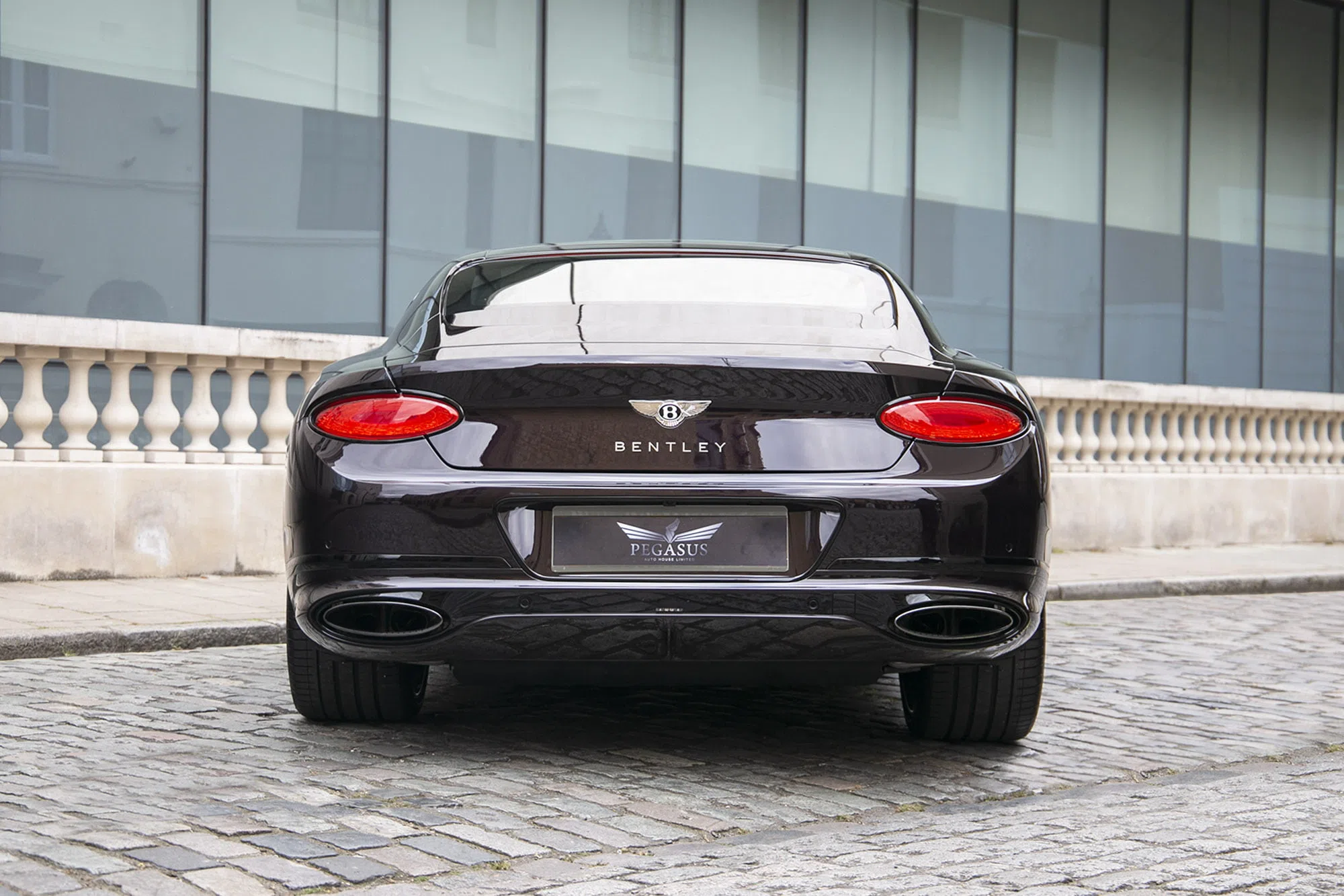 2021 Bentley Continental GT, rear three-quarter view, Black Velvet