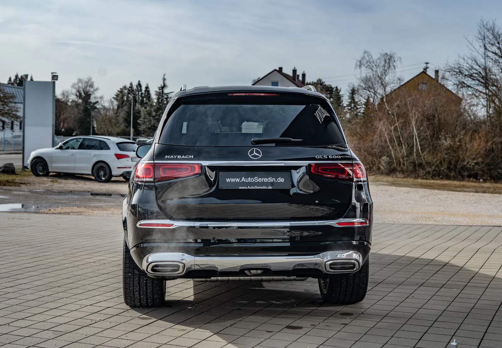 2022 Mercedes-Maybach GLS 600, rear three-quarter view, OBSIDIAN BLACK | metallic