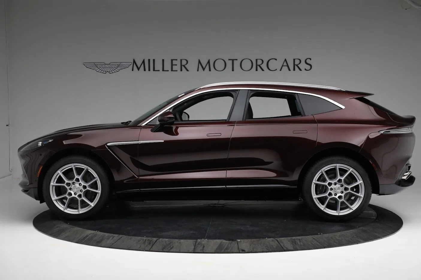 2021 Aston Martin DBX, side profile, DIVINE RED
