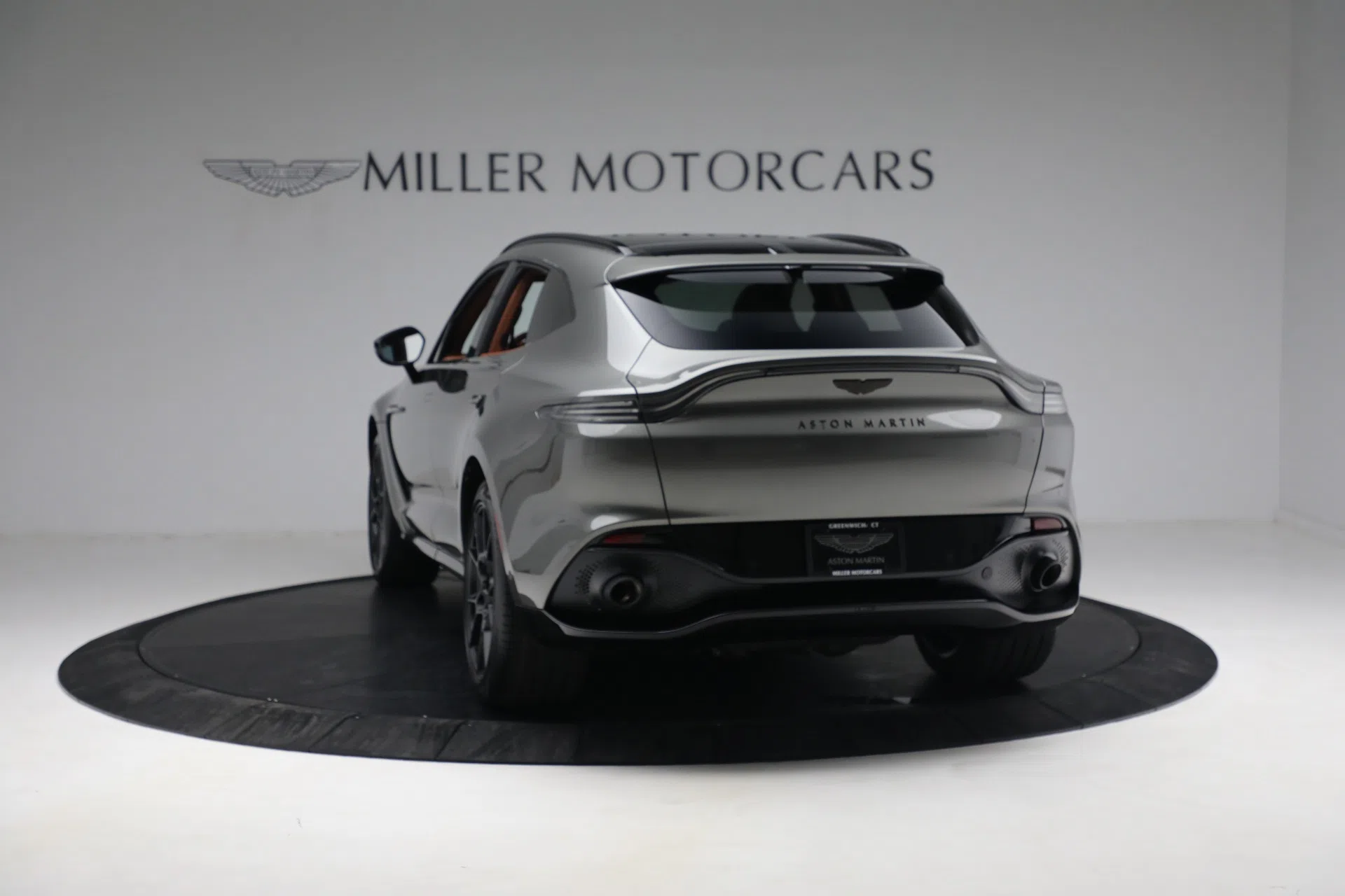 2021 Aston Martin DBX, rear three-quarter view, Q - Scintilla Silver