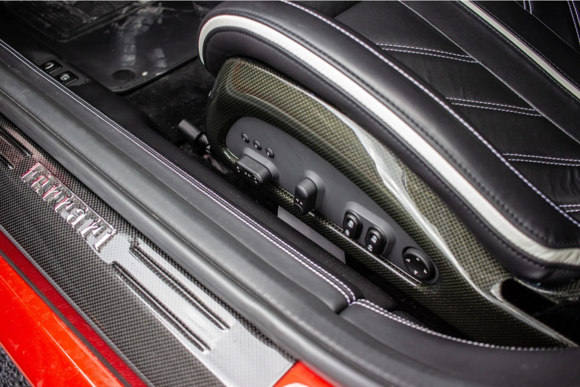 2011 Ferrari 599 SA Aperta interior, center console, Black Leather