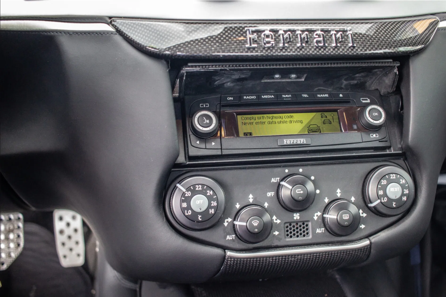 2011 Ferrari 599 SA Aperta interior, center console, Black Leather